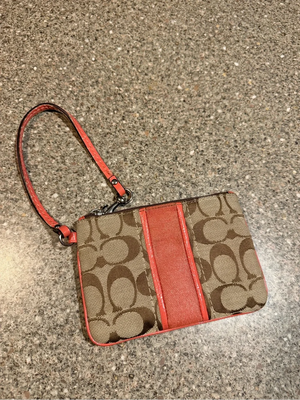 Coach Signature Monogram Wristlet in Brown and Coral